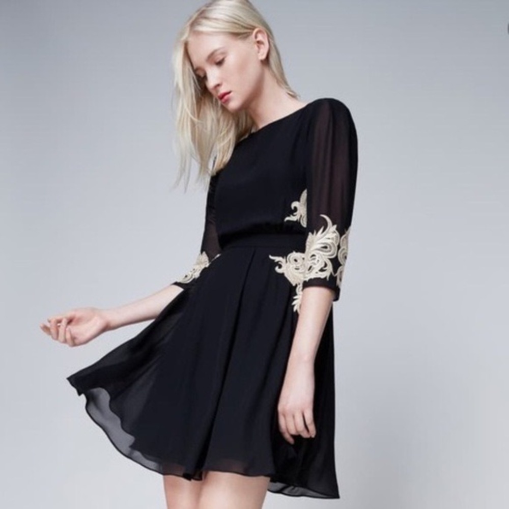 Embroidered black dress